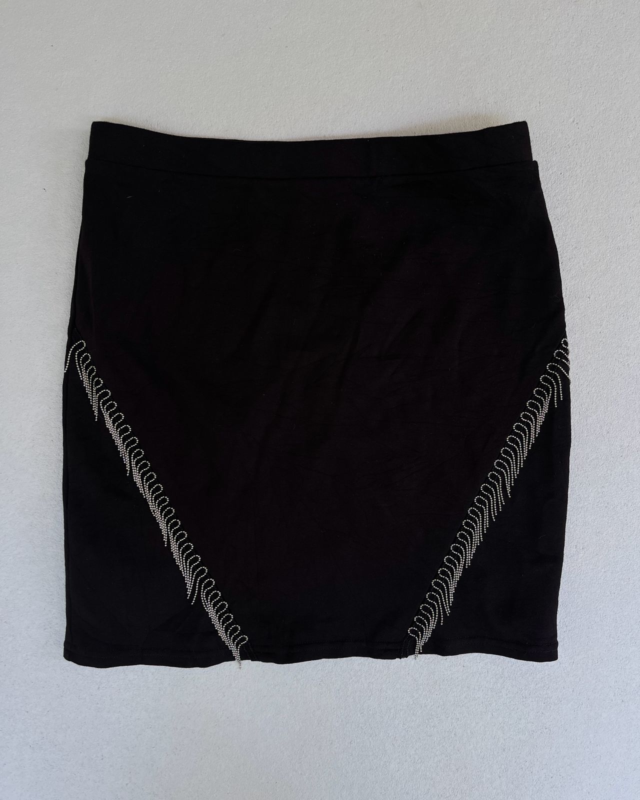 Black mini skirt from the brand Sinsay