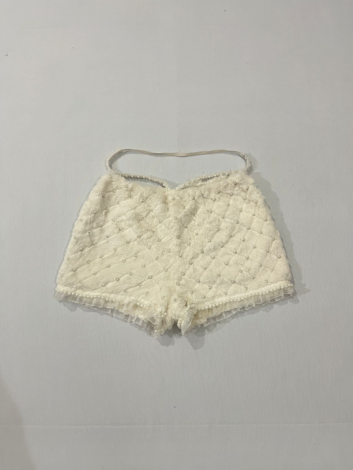 High-waisted quilted faux-fur mini shorts / hot pants