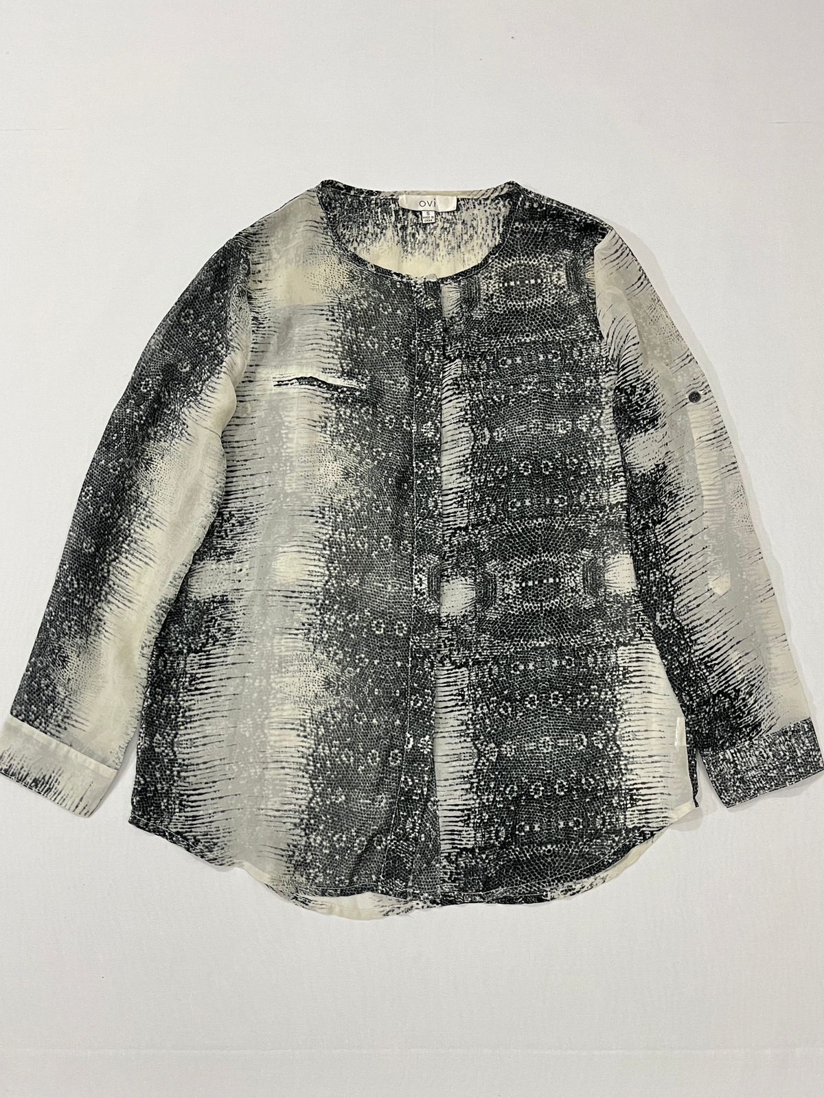 Lightweight, button-up women’s blouse.